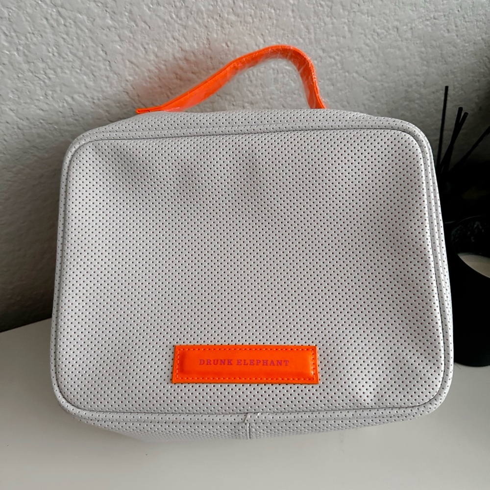 Drunk Elephant White and Orange Bag
